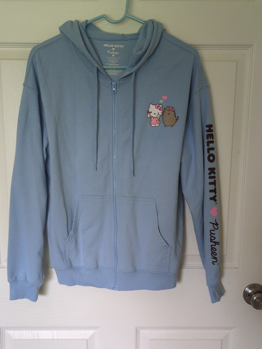 Hello Kitty Light Blue Zip-Up Hoodie with Chest Pusheen Graphic Ladies